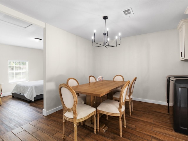 1821 Melissa St, Arlington, TX 76010 - dining room with baseboards, visible vents, dark wood finished floors, and an inviting chandelier