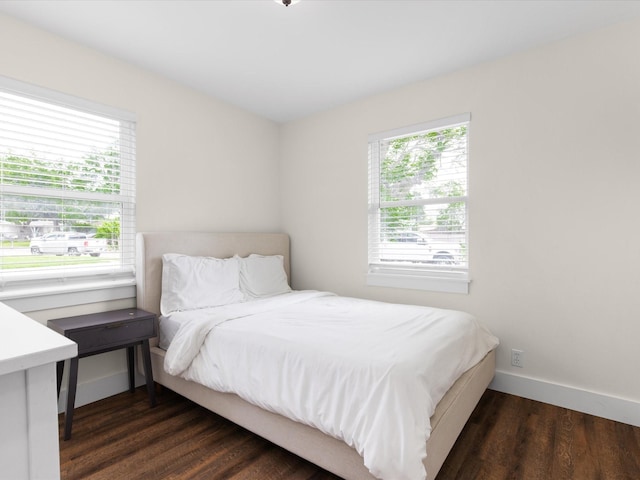 1821 Melissa St, Arlington, TX 76010 - bedroom featuring baseboards and dark wood-type flooring