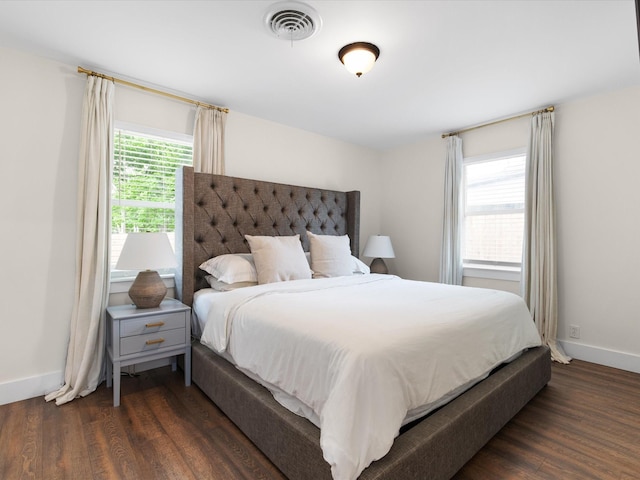 1821 Melissa St, Arlington, TX 76010 - bedroom with baseboards, dark wood-style flooring, and visible vents