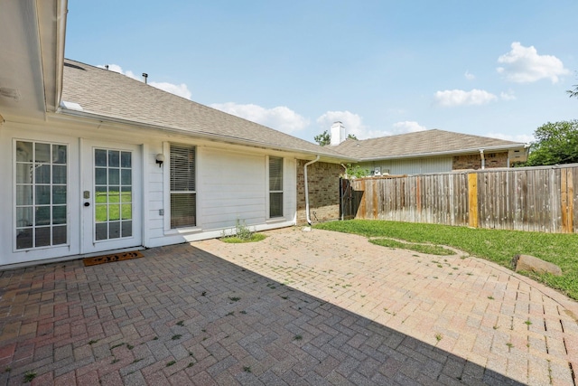 view of patio / terrace with a fenced backyard and french doors