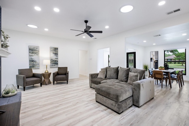living room featuring visible vents, recessed lighting, light wood finished floors, and ceiling fan