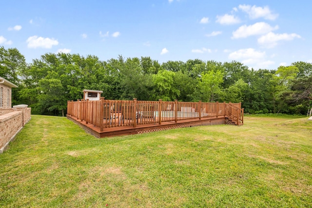 view of yard with a deck