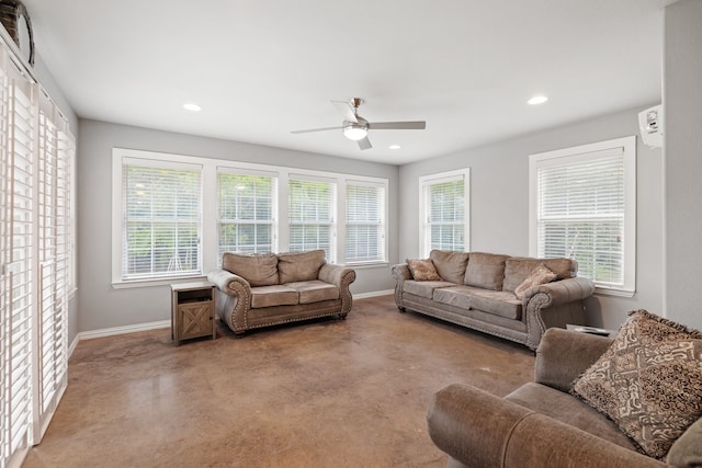 living area featuring a healthy amount of sunlight, baseboards, a ceiling fan, and recessed lighting