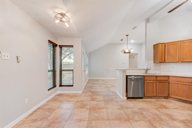 kitchen with light countertops, decorative backsplash, lofted ceiling, and dishwasher