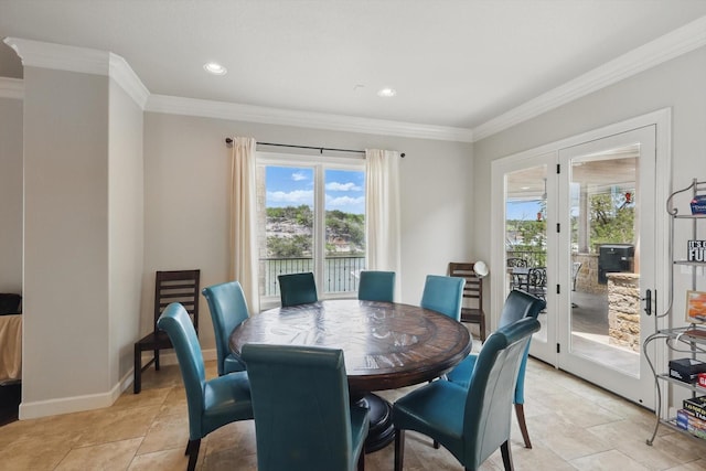dining space with baseboards, ornamental molding, french doors, and recessed lighting