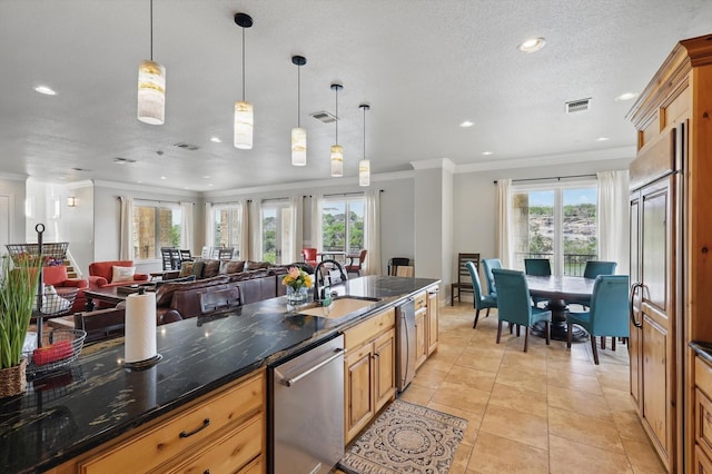 kitchen featuring a sink, stainless steel dishwasher, recessed lighting, and visible vents