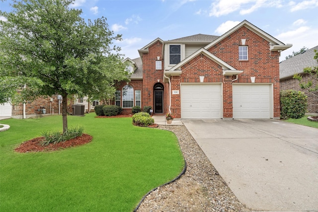 traditional-style home with central air condition unit, brick siding, driveway, and a front yard