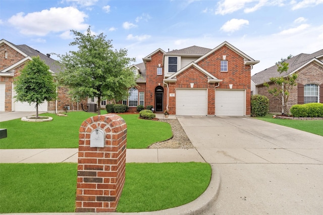 3136 Deer Run Dr, Little Elm, TX 75068 - traditional-style house with brick siding, driveway, a front lawn, and a garage