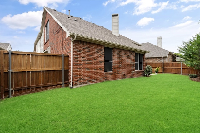 3136 Deer Run Dr, Little Elm, TX 75068 - rear view of house featuring brick siding, a chimney, and roof with shingles