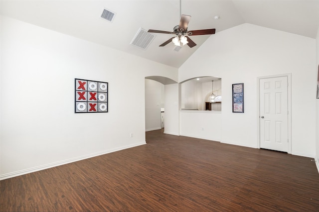 unfurnished living room with a ceiling fan, dark wood-style floors, and visible vents