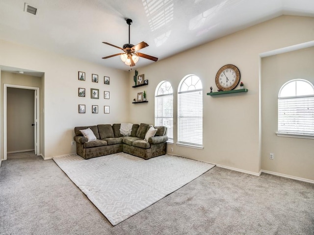 300 Aspenwood Trl, Forney, TX 75126 - carpeted living area with baseboards, plenty of natural light, a ceiling fan, and visible vents