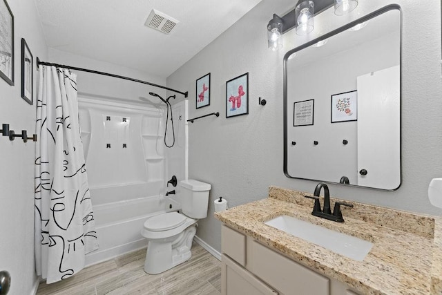 300 Aspenwood Trl, Forney, TX 75126 - full bath with visible vents, shower / tub combo with curtain, vanity, wood finished floors, and toilet