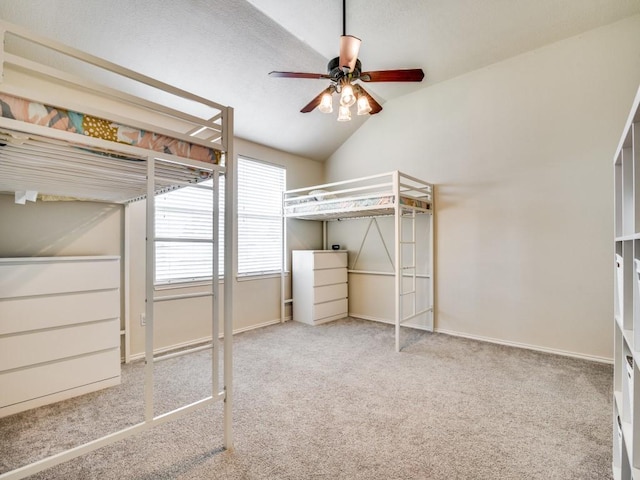 300 Aspenwood Trl, Forney, TX 75126 - unfurnished bedroom featuring baseboards, carpet flooring, ceiling fan, and lofted ceiling