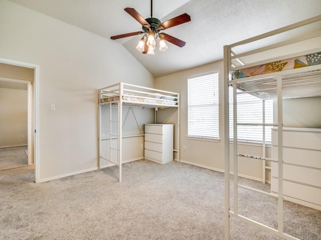 300 Aspenwood Trl, Forney, TX 75126 - unfurnished bedroom featuring baseboards, carpet flooring, a ceiling fan, and vaulted ceiling