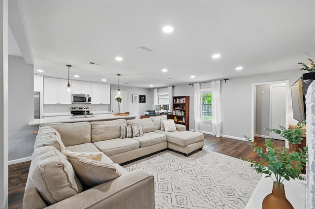 2108 Stonegate Dr N, Bedford, TX 76021 - living room with baseboards, dark wood-type flooring, recessed lighting, and visible vents