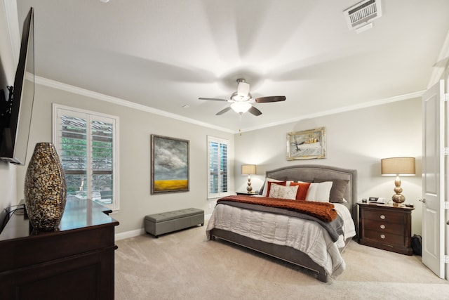 bedroom featuring crown molding, multiple windows, light colored carpet, and visible vents