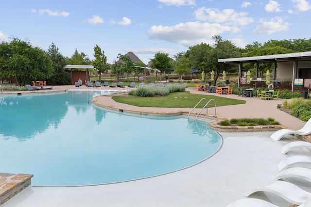 pool with a patio