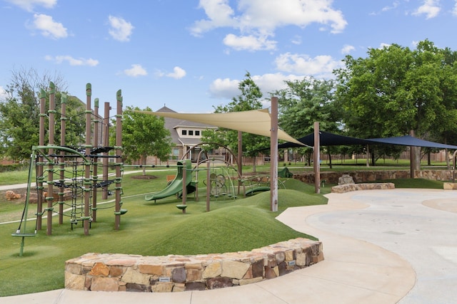 view of community with a yard and playground community