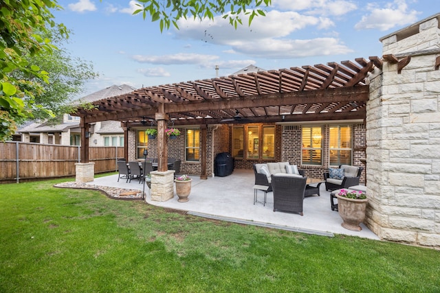 exterior space featuring fence, a pergola, brick siding, outdoor lounge area, and a yard