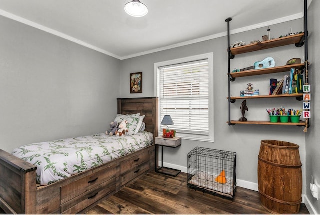 bedroom featuring baseboards, ornamental molding, and dark wood-style floors
