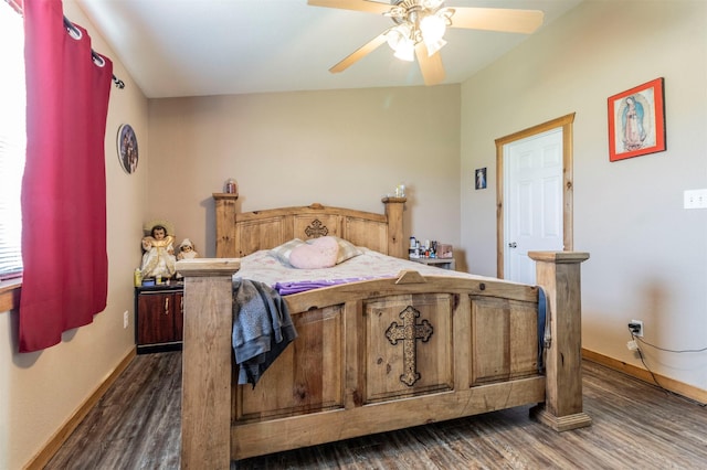 bedroom with baseboards, a ceiling fan, and dark wood-style flooring