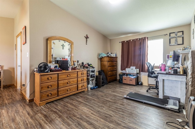 office space with lofted ceiling and wood finished floors