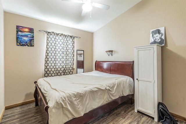 bedroom featuring baseboards, a ceiling fan, wood finished floors, and lofted ceiling