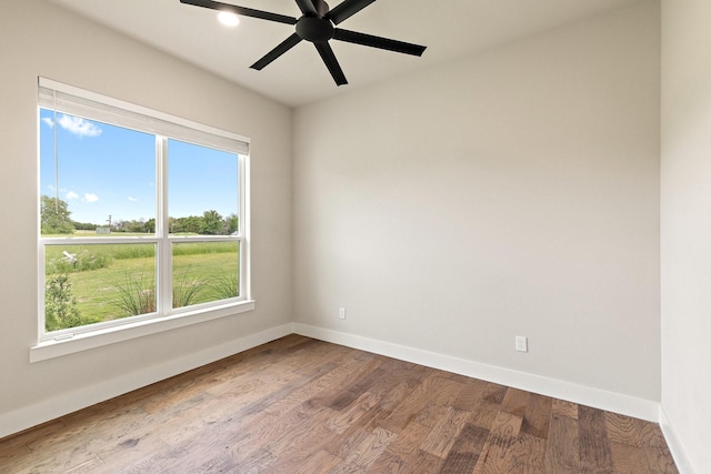 8408 Fullerton Dr, Cleburne, TX 76033 - empty room with plenty of natural light, baseboards, and dark wood-type flooring