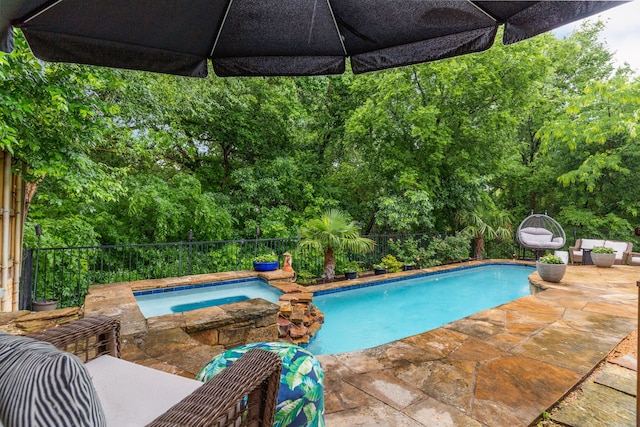 5604 Turtle Way, Mckinney, TX 75072 - view of swimming pool featuring a patio, a fenced backyard, and an in-ground hot tub