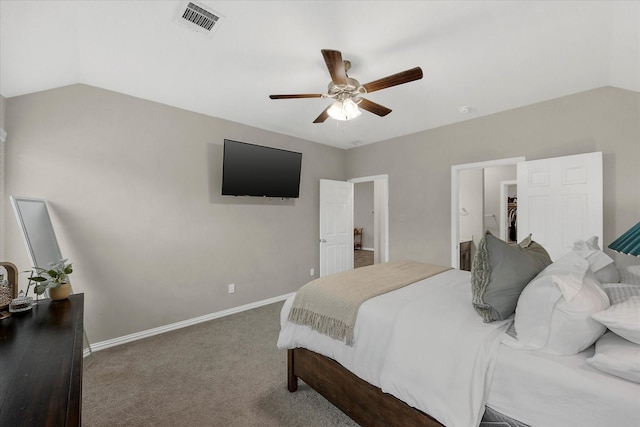 carpeted bedroom with a ceiling fan, baseboards, visible vents, and vaulted ceiling