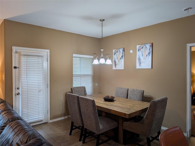 2016 Karsen Ln, Heartland, TX 75126 - tiled dining area featuring baseboards and a chandelier