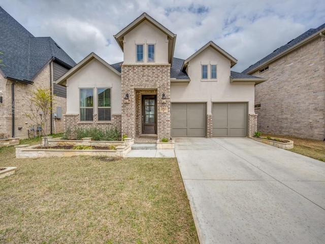 2513 Silver Leaf Dr, Northlake, TX 76226 - view of front of property with brick siding, driveway, a front lawn, and stucco siding