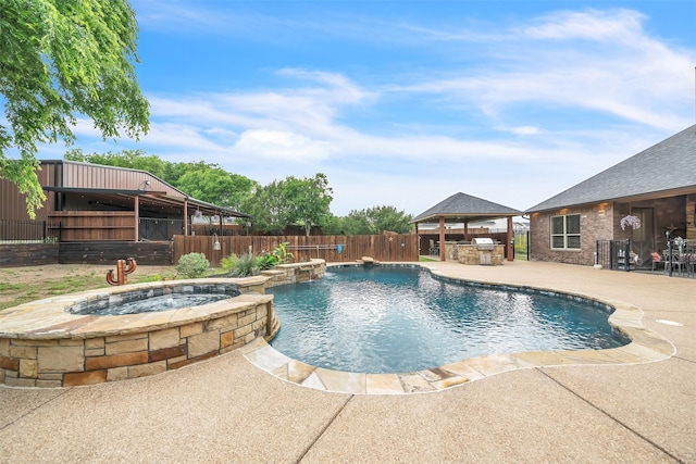 7839 Blanchard Way, Fort Worth, TX 76126 - view of pool featuring a gazebo, a pool with connected hot tub, an outdoor kitchen, a fenced backyard, and a patio area