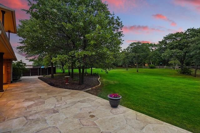 view of yard featuring a patio and fence