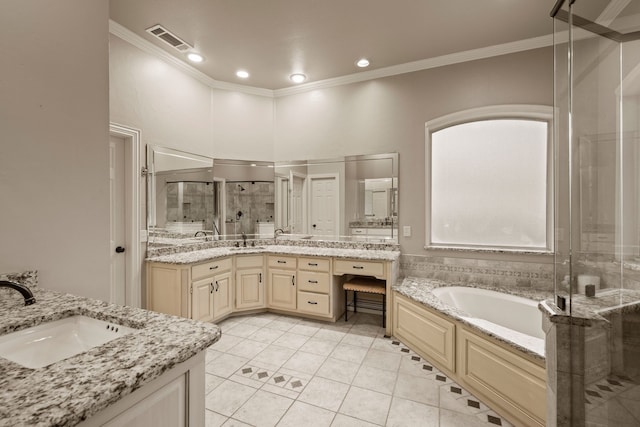full bathroom featuring a sink, visible vents, a shower stall, and two vanities