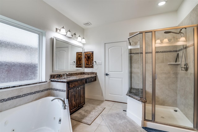 bathroom with visible vents, tile patterned flooring, a shower stall, vanity, and a whirlpool tub