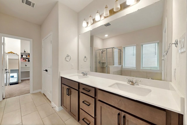 1907 Sandpiper Way, Princeton, TX 75407 - full bath with a shower stall, visible vents, a sink, and double vanity