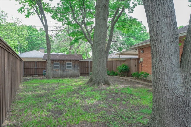 view of yard featuring a fenced backyard