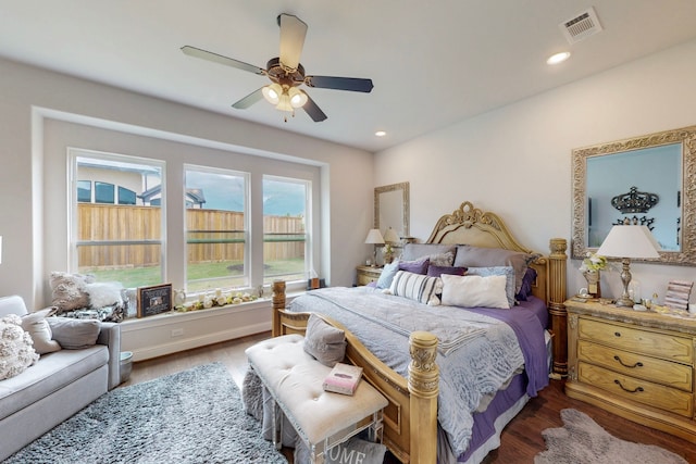 bedroom with ceiling fan, recessed lighting, wood finished floors, and visible vents