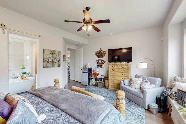 bedroom featuring a ceiling fan and wood finished floors