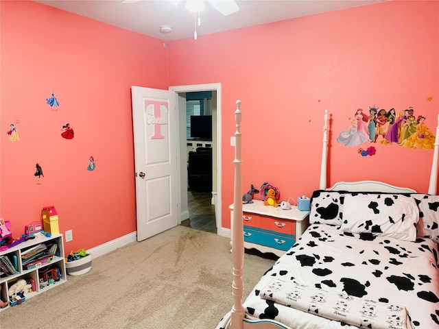 bedroom with baseboards, a ceiling fan, and carpet
