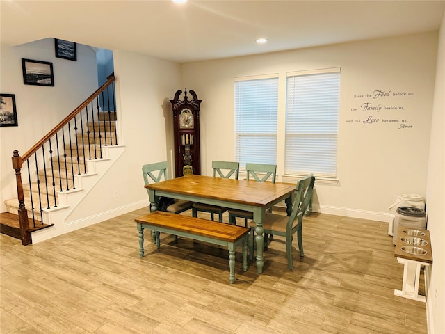 dining area with stairway, baseboards, light wood-type flooring, and recessed lighting