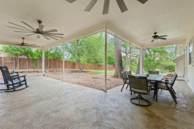 3409 San Bar Ln, Colleyville, TX 76034 - empty room with a ceiling fan, baseboards, vaulted ceiling, and wood finished floors