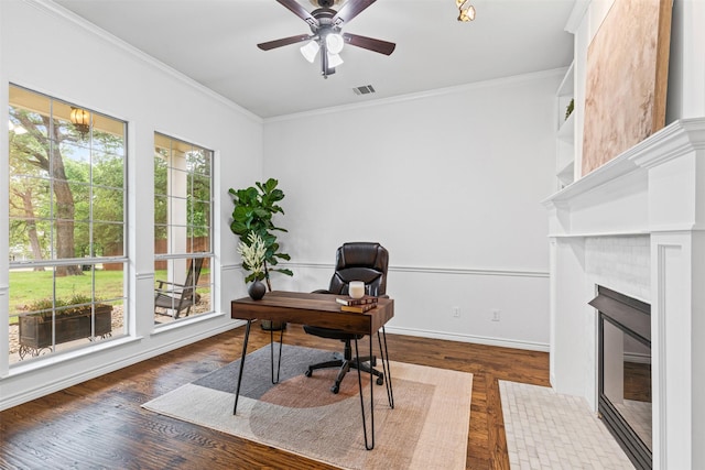 office with visible vents, ornamental molding, a ceiling fan, and wood finished floors