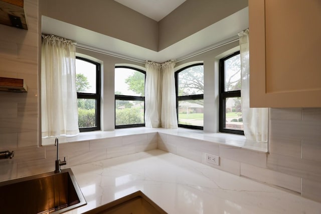 3509 Arbuckle Dr, Plano, TX 75075 - bathroom with a wealth of natural light, a sink, and tasteful backsplash