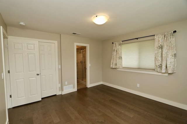 3509 Arbuckle Dr, Plano, TX 75075 - unfurnished bedroom featuring baseboards, a closet, dark wood-style flooring, and visible vents