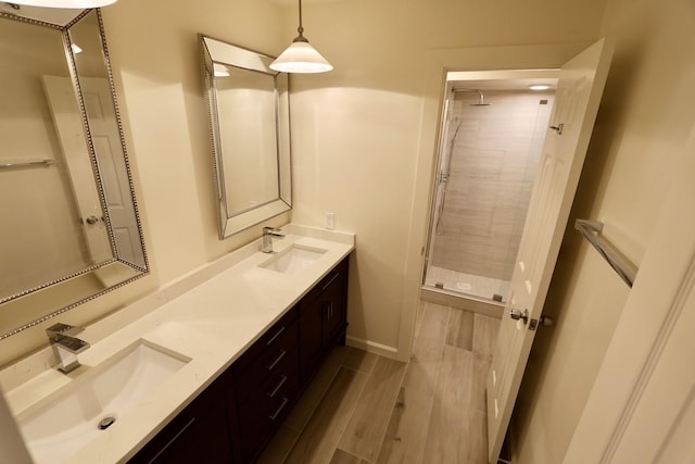 3509 Arbuckle Dr, Plano, TX 75075 - bathroom featuring double vanity, a shower stall, and a sink