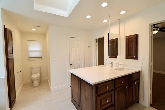 3509 Arbuckle Dr, Plano, TX 75075 - bathroom featuring recessed lighting, baseboards, toilet, and vanity