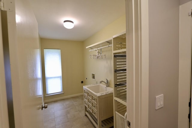 3509 Arbuckle Dr, Plano, TX 75075 - laundry area featuring light tile patterned flooring, laundry area, a sink, hookup for a washing machine, and hookup for an electric dryer