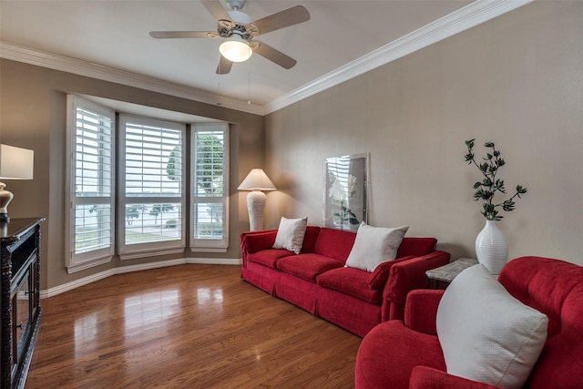 3788 Zion Rd, Garland, TX 75043 - living room featuring baseboards, ornamental molding, and wood finished floors